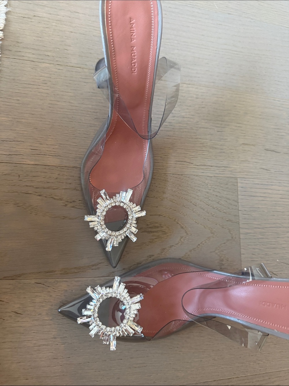 Amina Muaddi Clear PVC Slingback Pumps with Blush Insole and Crystal Sunburst